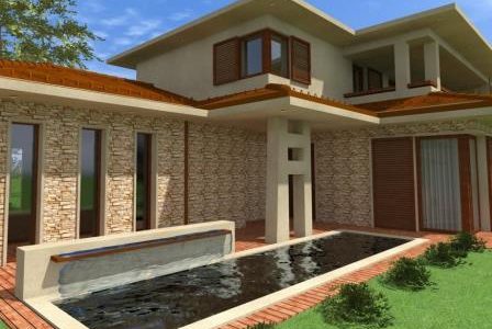 Construção de moradia com espelho d’água e fachada revestida a pedra.