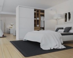 Roupeiros por medida utilizado como divisória de quarto