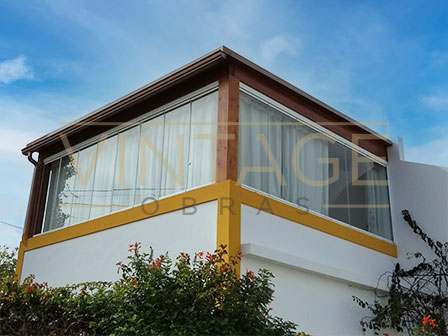 Instalação de cortina de vidro e pintura de fachada